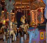 Joyce on a carousel near the Eiffel Tower