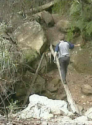 Joshua makes his way across a washout.